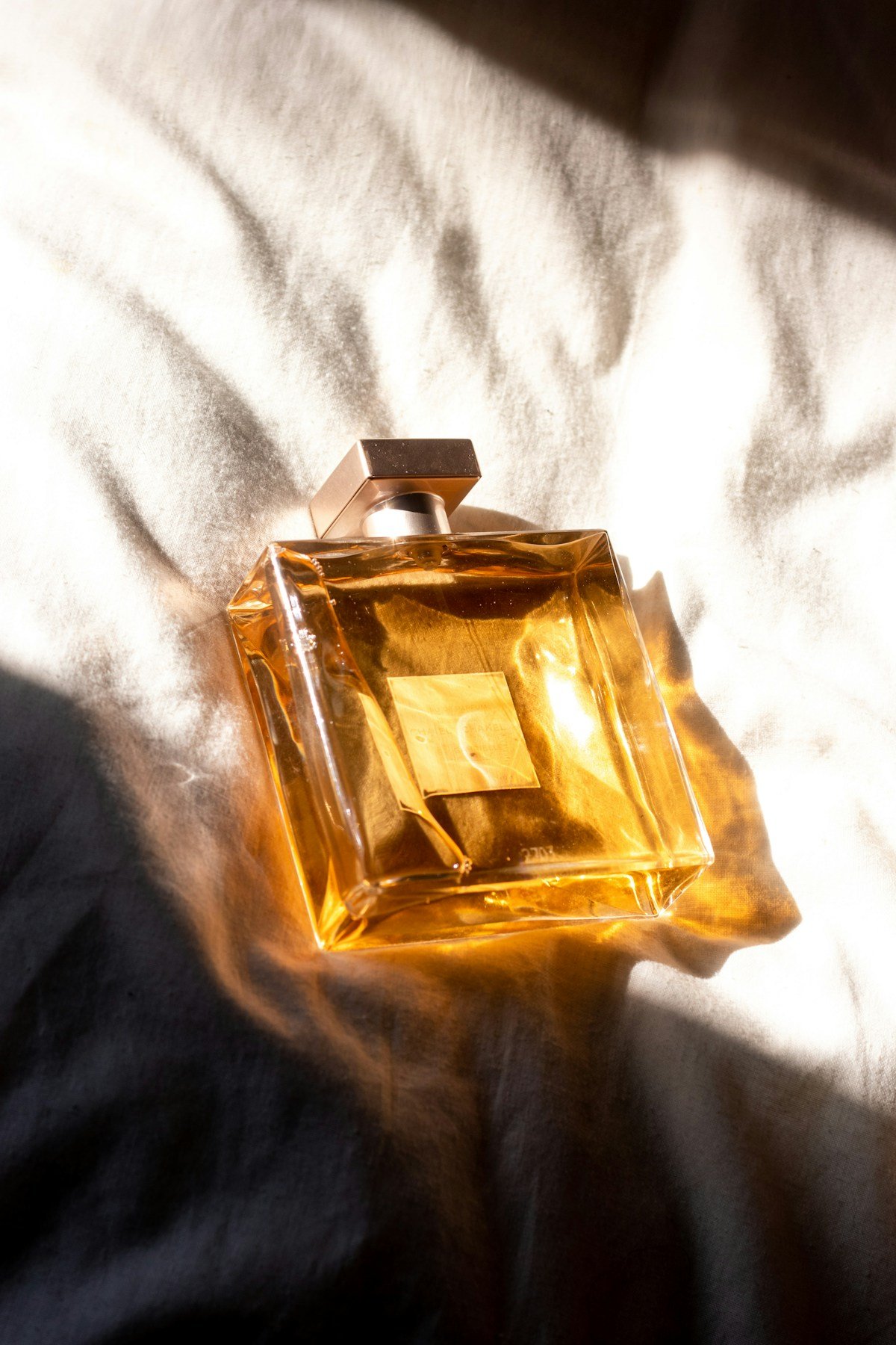 Amber perfume in warm sunlight